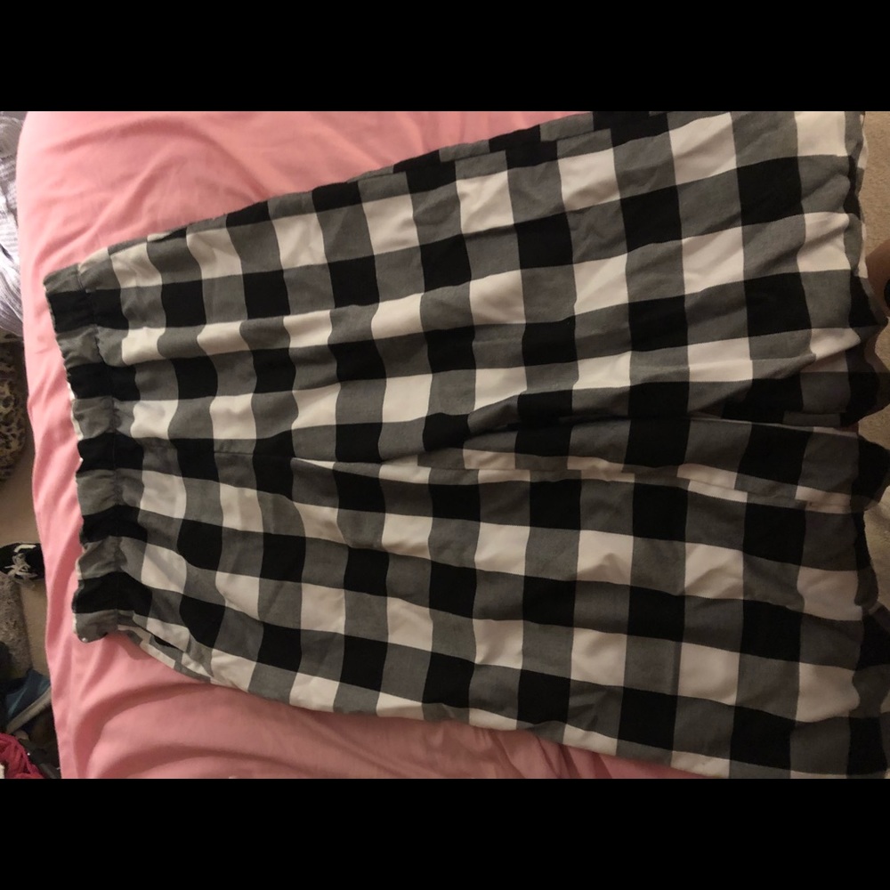 Checked pants with cinched waist and flare leg